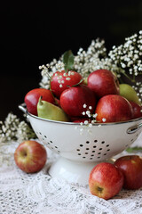 Still life with beautiful red apples on a table. Juicy summer fruit close up photo. Eating fresh concept. 