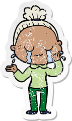 distressed sticker of a cartoon crying old lady