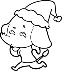 line drawing of a elephant remembering wearing santa hat