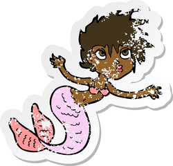 retro distressed sticker of a cartoon mermaid