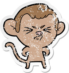 distressed sticker of a cartoon annoyed monkey