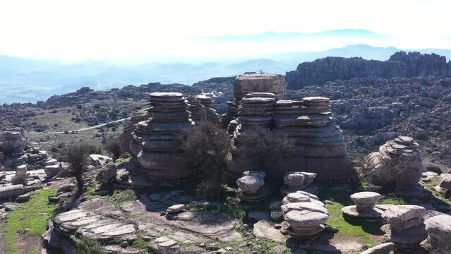Impressive Mountain top rocks in Torcal de Antequera seen from above, aerial drone view of karstik rocks in Spain