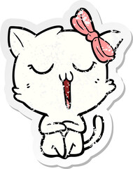 distressed sticker of a cartoon cat