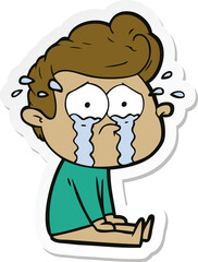 sticker of a cartoon crying man