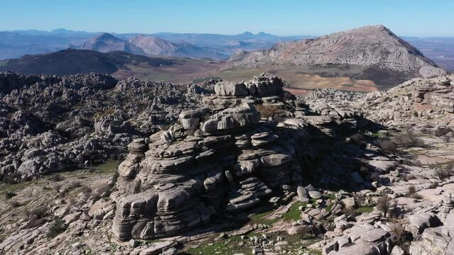 Impressive Mountain top rocks in Torcal de Antequera seen from above, aerial drone view of karstik rocks in Spain