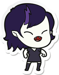 sticker of a cartoon laughing vampire girl