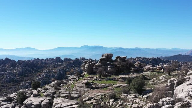 Impressive Mountain top rocks in Torcal de Antequera seen from above, aerial drone view of karstik rocks in Spain