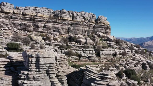 Impressive Mountain top rocks in Torcal de Antequera seen from above, aerial drone view of karstik rocks in Spain