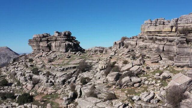Impressive Mountain top rocks in Torcal de Antequera seen from above, aerial drone view of karstik rocks in Spain