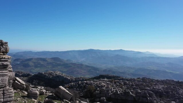 Impressive Mountain top rocks in Torcal de Antequera seen from above, aerial drone view of karstik rocks in Spain