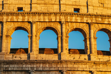 Rome Italy, close-up view of Colosseum with warm unset light