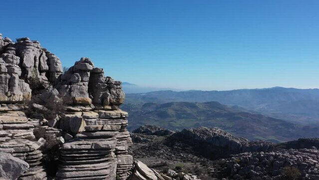 Impressive Mountain top rocks in Torcal de Antequera seen from above, aerial drone view of karstik rocks in Spain