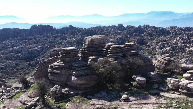 Impressive Mountain top rocks in Torcal de Antequera seen from above, aerial drone view of karstik rocks in Spain
