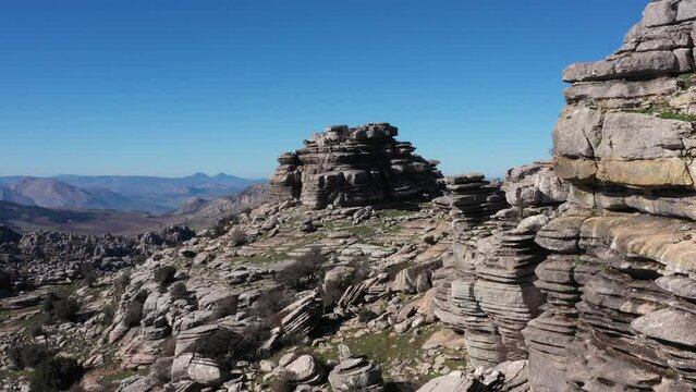 Impressive Mountain top rocks in Torcal de Antequera seen from above, aerial drone view of karstik rocks in Spain