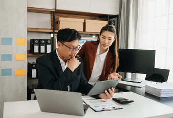 Portrait of success business people working together in home office. Couple teamwork startup concept