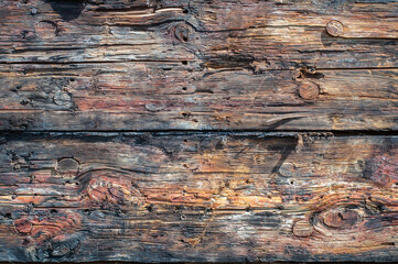 Wooden planks from hull of an old ship. Closeup of wood planks. Texture background. Cover photo.
