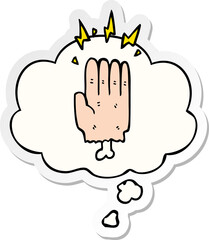 cartoon magic halloween zombie hand and thought bubble as a printed sticker