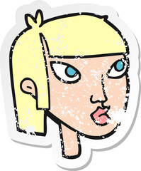retro distressed sticker of a cartoon female face