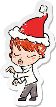 distressed sticker cartoon of a woman with eyes shut wearing santa hat