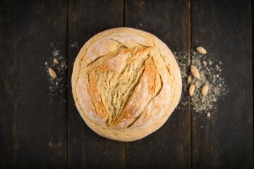freshly baked rustic sourdough bread dusted with powdered sugar