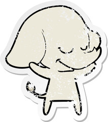 distressed sticker of a cartoon smiling elephant