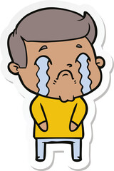 sticker of a cartoon man crying
