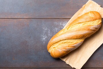 fresh baked bread, delicious freshly baked bread resting on a kitchen towel on a wooden table
