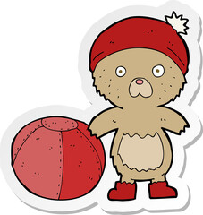 sticker of a cartoon bear in hat with ball