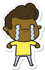 sticker of a cartoon man crying