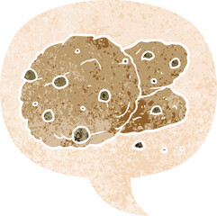 cartoon cookies and speech bubble in retro textured style