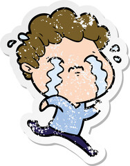 distressed sticker of a cartoon man crying