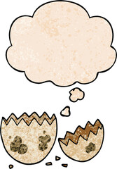 cartoon cracked egg and thought bubble in grunge texture pattern style