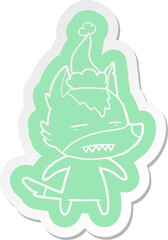cartoon  sticker of a wolf showing teeth wearing santa hat
