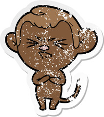 distressed sticker of a cartoon annoyed monkey