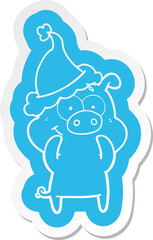 happy cartoon  sticker of a pig wearing santa hat