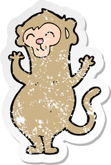 retro distressed sticker of a cartoon monkey