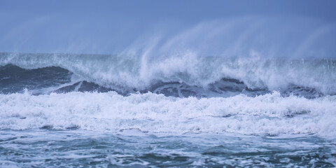 crashing waves off chapel Porth beach cornwall england uk 