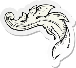 retro distressed sticker of a cartoon traditional hand drawn floral swirl