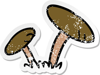 distressed sticker cartoon doodle of some mushrooms