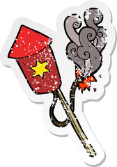 retro distressed sticker of a cartoon firework with burning fuse