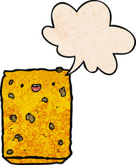 cartoon biscuit and speech bubble in retro texture style