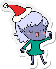 sticker cartoon of a elf girl wearing santa hat