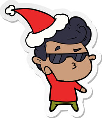 sticker cartoon of a cool guy wearing santa hat