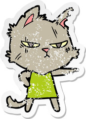 distressed sticker of a tough cartoon cat girl pointing