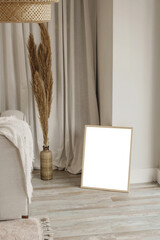 Empty white rectangle frame lifestyle mockup in neutral scandinavian interior for presentation own digital arts, paintings and photos for sell it