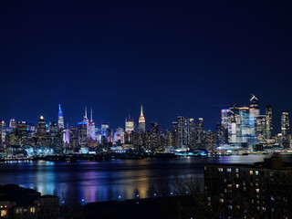 The stunning New York City Skyline as seen from across the Hudson River in early evening