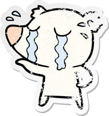 distressed sticker of a cartoon crying polar bear