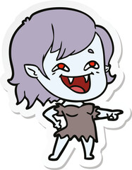 sticker of a cartoon laughing vampire girl