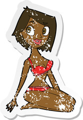 retro distressed sticker of a cartoon pretty woman in underwear
