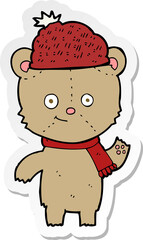 sticker of a cartoon bear in hat